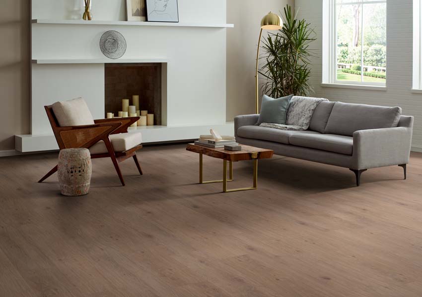 wood look medium toned vinyl flooring in living room